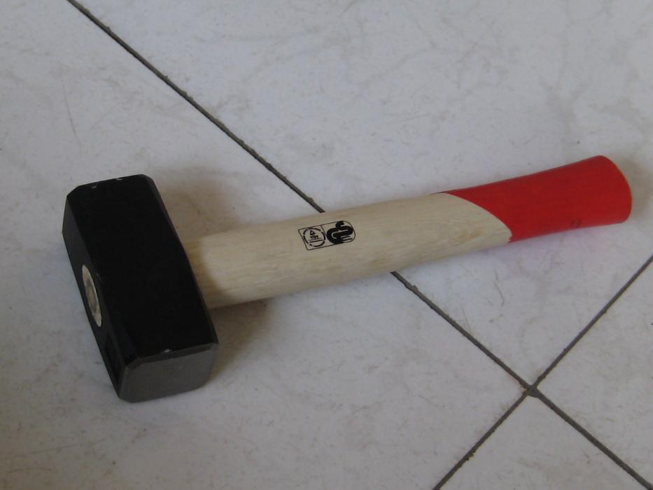 German type stoning hammer with wooden handle